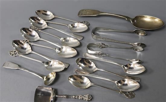 An early Victorian silver caddy spoon, assorted silver teaspoons and six plated teaspoons.